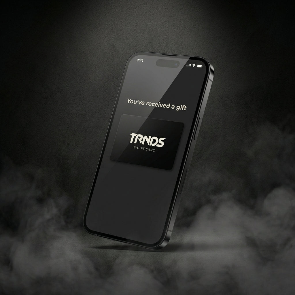 TRNDS E-Gift Card delivered instantly via email on smartphone, digital gift voucher for authenticated sneakers and streetwear, available from £10 to £1,000